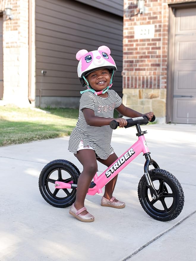 Strider 12” Sport Bike - No Pedal Balance Bicycle for Kids 1 to 4 Years - Includes Safety Pad, Padded Seat, Mini Grips & Flat-Free Tires - Tool-Free Assembly & Adjustments