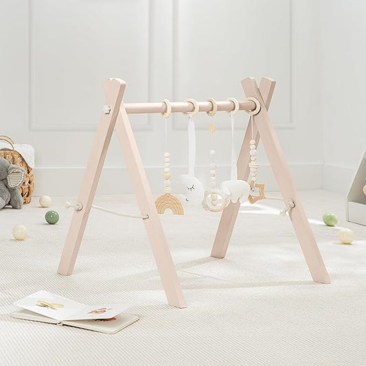 Comfy Cubs Wooden Baby Play Gym - Natural Finish Pinewood Baby Activity Gym with 5 Sensory Hanging Toys - Easy No-Tool Assembly, Safe and Durable for Infant Motor and Visual Development - Blush