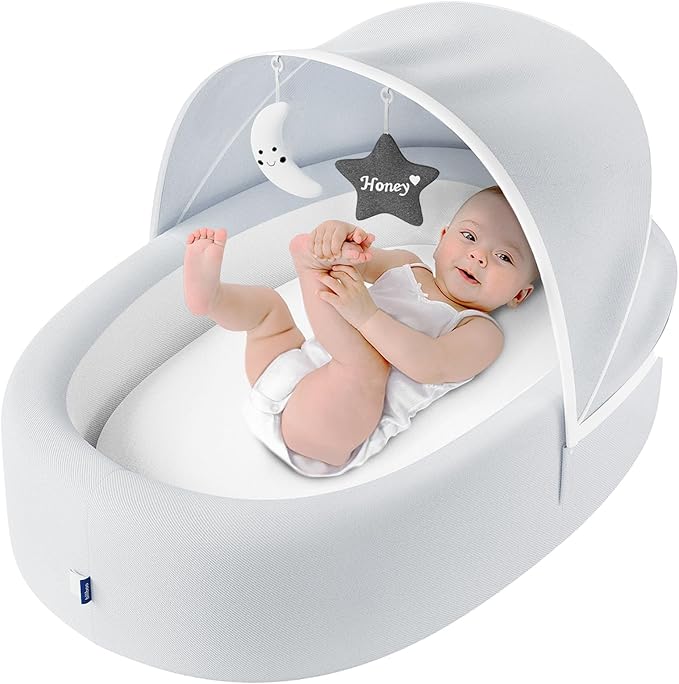 Premium Portable Baby Lounger Nest – Foldable Travel Bassinet for Newborn & Infant with Mesh Canopy, 2 Toys, Waterproof Mattress & Removable Cover – Cream