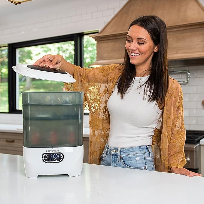Baby Brezza Bottle Sterilizer and Dryer Advanced – 33% Faster - Largest Capacity Steam Sanitizer - Universal Sterilization Machine for All Bottles + Pump Parts - HEPA Air Filter