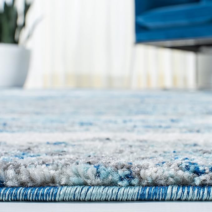 SAFAVIEH Evoke Collection Area Rug - 9' x 12', Light Blue & Grey, Modern Abstract Design, Non-Shedding & Easy Care, Ideal for High Traffic Areas in Living Room, Bedroom (EVK272M)