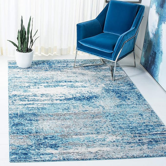 SAFAVIEH Evoke Collection Area Rug - 9' x 12', Light Blue & Grey, Modern Abstract Design, Non-Shedding & Easy Care, Ideal for High Traffic Areas in Living Room, Bedroom (EVK272M)
