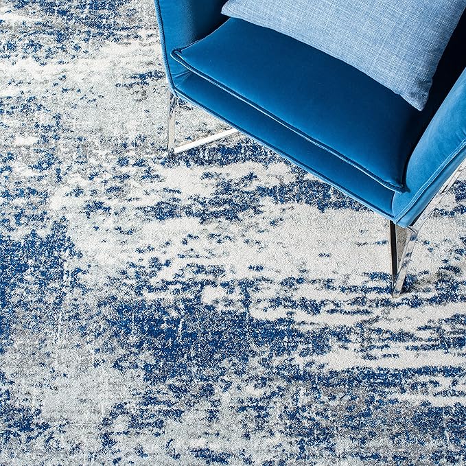 SAFAVIEH Evoke Collection Area Rug - 9' x 12', Dark Blue & Grey, Modern Abstract Design, Non-Shedding & Easy Care, Ideal for High Traffic Areas in Living Room, Bedroom (EVK272L)